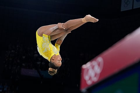 Rebeca Andrade performs on the balance beam